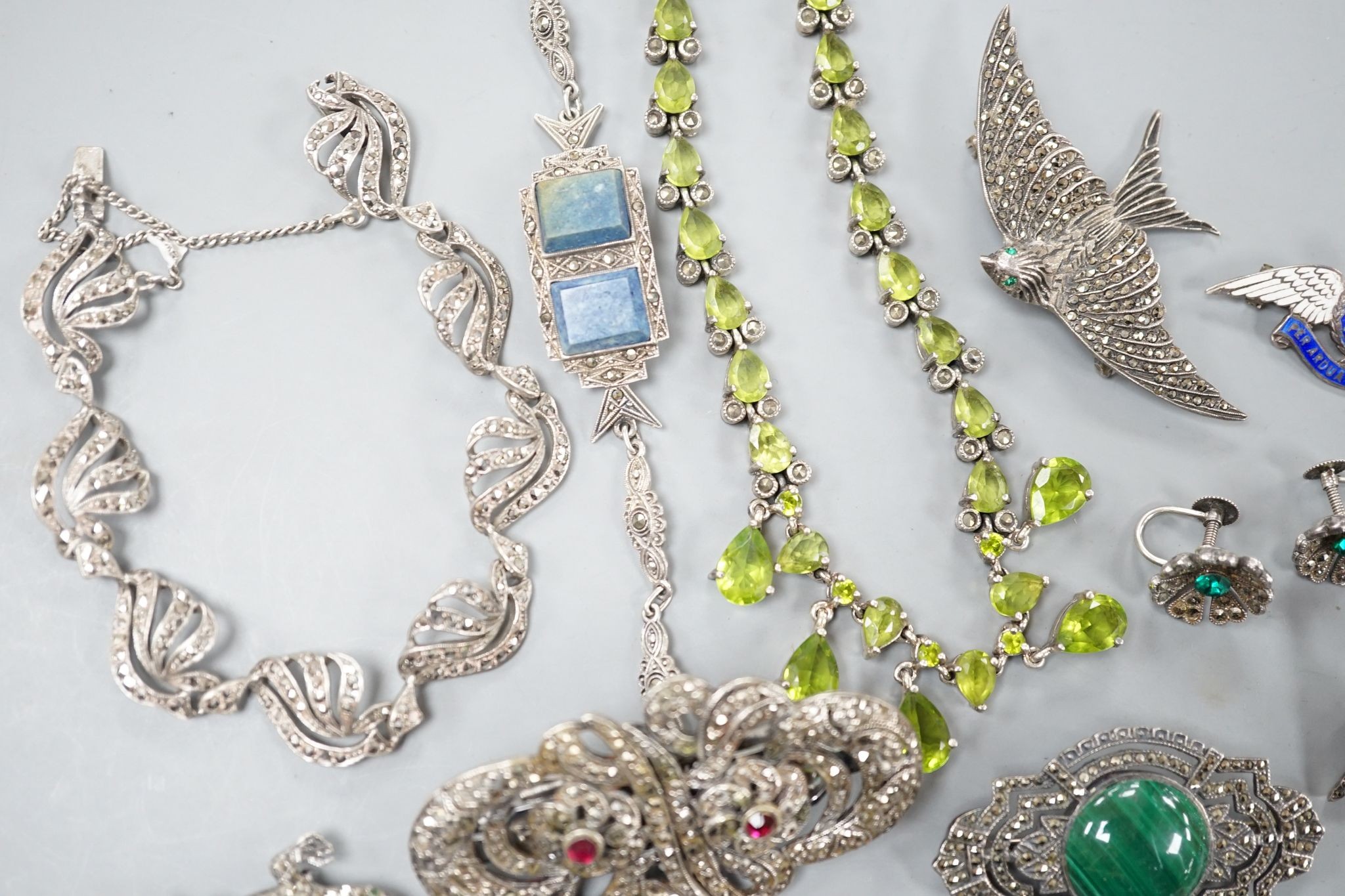 A small collection of assorted mainly white metal and marcasite set jewellery, including brooches, bracelet etc. and an enamelled RAF brooch.